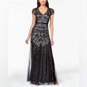 Adrianna Papell cap-sleeve beaded gown in black.